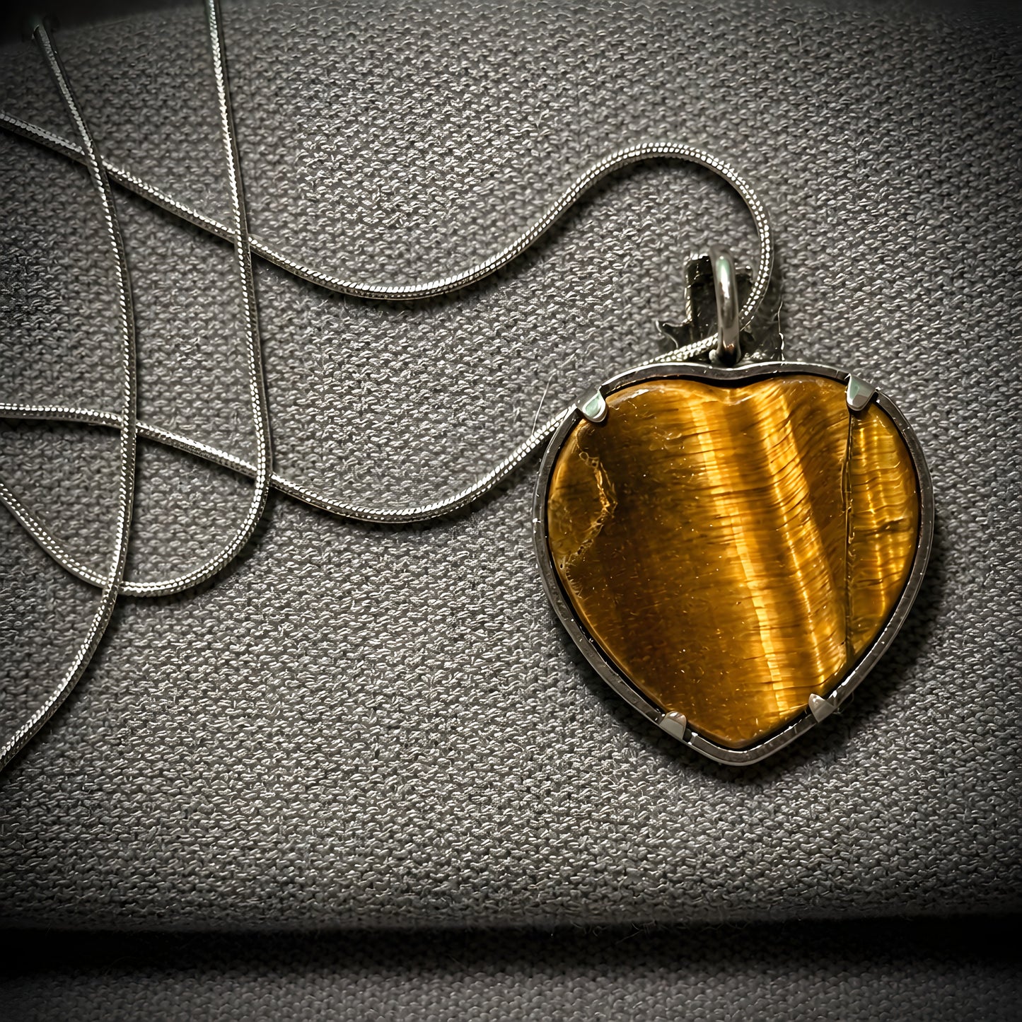 The Dragon’s Heart Reversible Tiger’s Eye Pendant